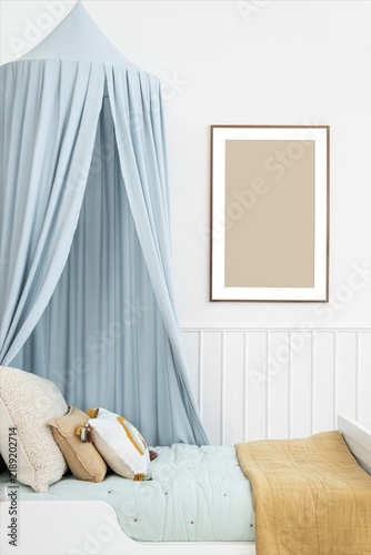 Принти на полотні Soft pastel nursery bedroom with canopy bed and framed wall art