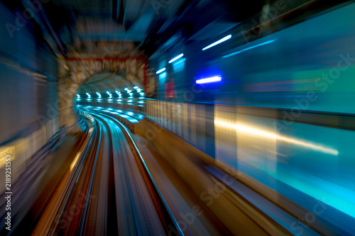 Foto Underground train tunnel with motion effects.