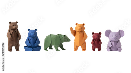 Set of colorful paper craft bear figurines isolated on a white background