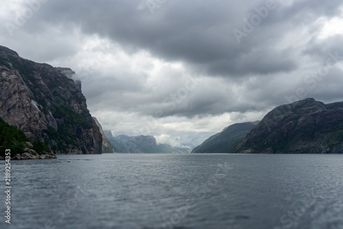 Lysefjord mountains and water under cloudy sky in Rogaland, Norway