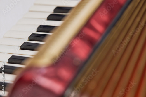 Obraz na płótnie Vintage musical instrument keyboard with blurred keys and colorful retro details