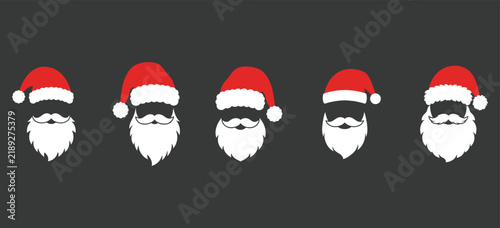 Set of santa claus hats and white beards dark background, christmas holiday vector icons collection