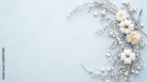 Curving Frosted Twigs and Ivory Ornaments on Blue