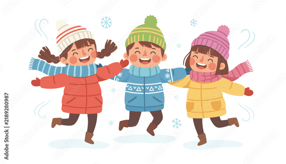 Fototapeta premium Three happy children jumping and laughing in the snow while wearing colorful winter coats, hats, and warm scarves.