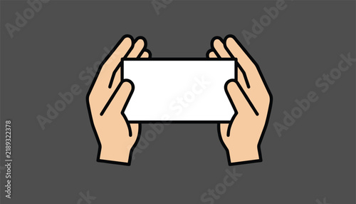Human hands holding up a blank white rectangular business card against a solid dark grey background.