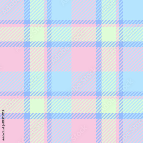 Seamless tartan plaid textile with balanced checks and a woven fabric texture. Light and blue tones support classic fabric heritage in a decorative fabric surface for decorative backgrounds.