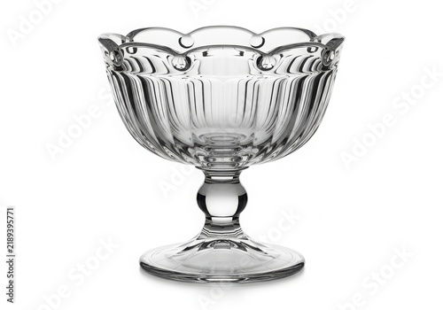 Elegant silver goblet with decorative rim isolated on white background