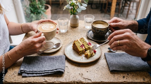 People sharing coffee and dessert