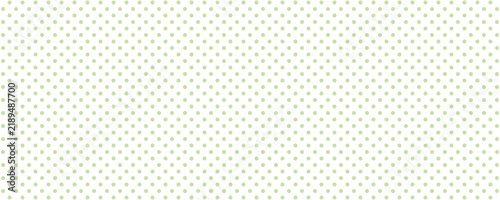 Green polka dots in the white background.Eps10