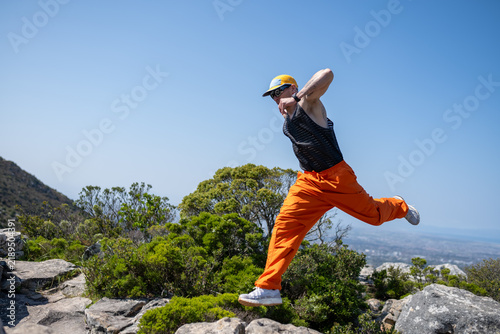 trail runner in the mountains action shot