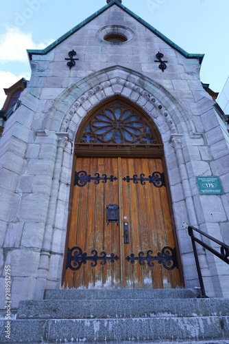 wooden door of a church in quebec, canada