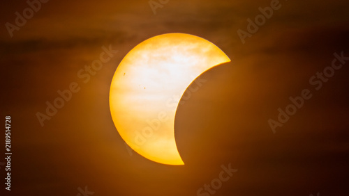 Quadro su tela Partial solar eclipse on September 12, 2026, with the Moon visibly covering a significant portion of the Sun
