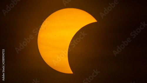 Quadro su tela Partial solar eclipse on September 12, 2026, with the Moon visibly covering a significant portion of the Sun