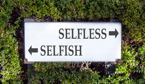 Canvas Print Selfless instead selfish words symbol