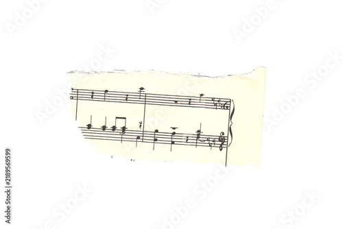 Obraz na płótnie Scrap of old torn music sheet, vintage yellowed ripped paper with notes isolated for design