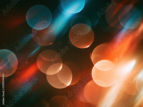 Abstract orange and blue bokeh lights background