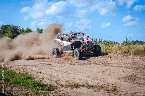 UTV, ATV, 4x4 adventure. Buggy extreme ride on sandy track