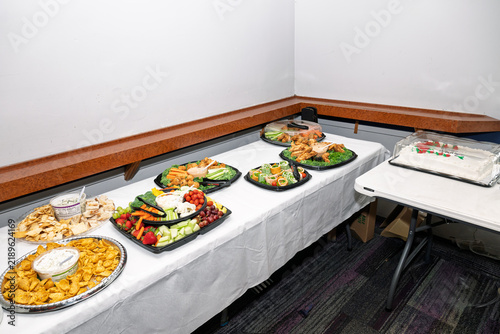 Snack trays on long white table