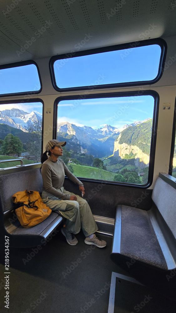 Fototapeta premium Exploring the stunning landscapes of Lauterbrunnen Wengen in Switzerland by train