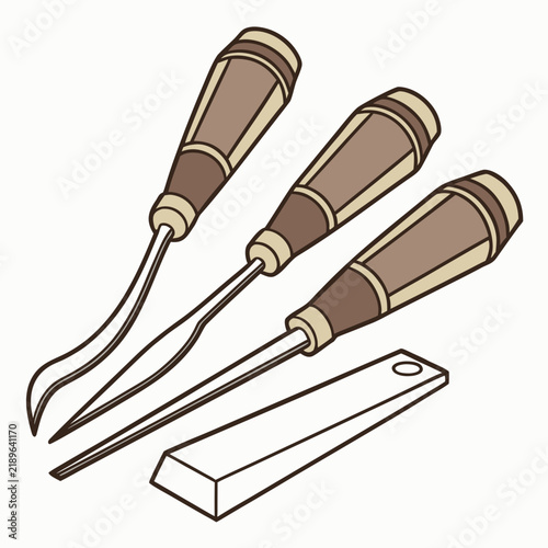 Foto Set of three wood carving chisels with brown wooden handles and a rectangular sh