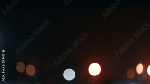 Cinematic film grain texture with soft light leaks, vintage analog photograph...