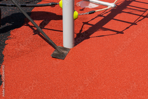 smoothing to make seamless surface made from recycled rubber and a binder
