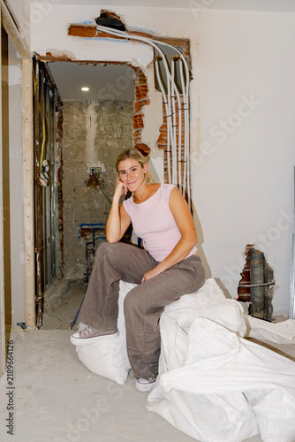 Portrait of architect sitting at home renovation site