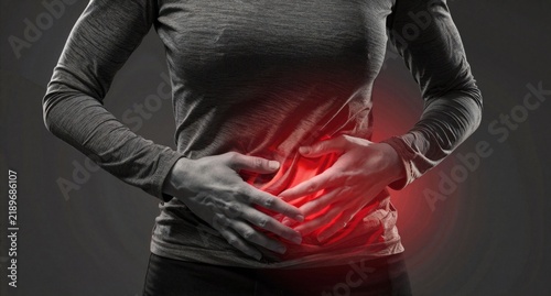 Woman with Lower Back Pain and Abdominal Ache, Chronic Spinal Pain Relief Concept