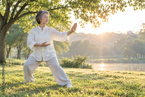 Older woman practicing tai chi