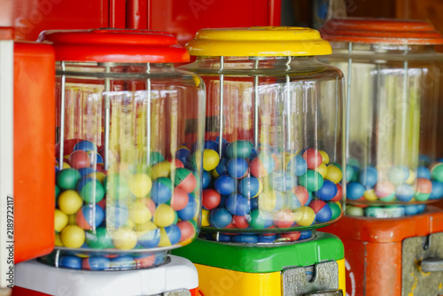 close up of old gumball machine at market