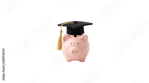 A pink piggy bank wearing a black graduation cap isolated on a white background.