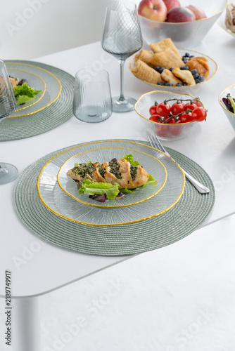 A festive table with alcohol and food. A stylish dining table.