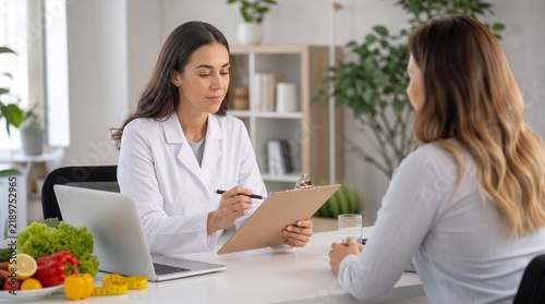 Professional Nutritionist Consulting A Female Client In A Modern Office With Fresh Vegetables, Diet Planning And Health Consultation Session