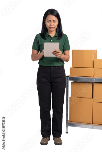 Warehouse Worker Checking Inventory on Tablet Near Boxes