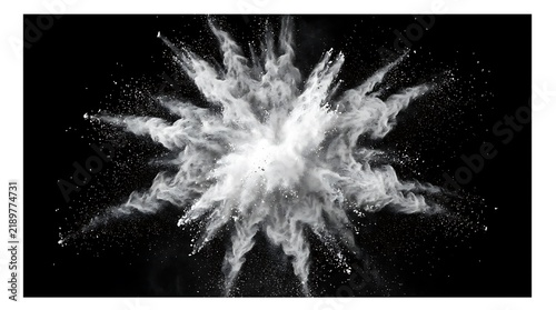 Close-up explosion of white powder particles in dark space creating dynamic burst effect.