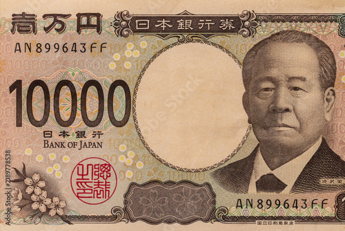 Japanese 10000 yen banknote front side close up with Eiichi Shibusawa portrait background