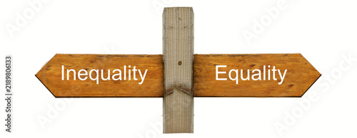 Fotografie A concept sign indicating Equality to the right and Inequality to the left