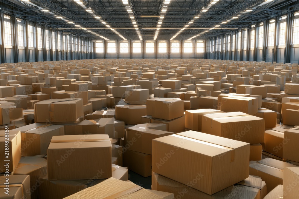 Fototapeta premium Large warehouse filled with countless cardboard boxes during daylight hours