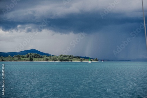 Fotografía Dark storm clouds and rain over the Croatian coast