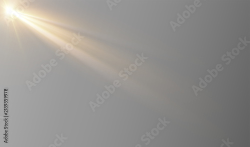 Fotografie Golden shining beam of light with a smooth diagonal direction, barely noticeable shimmer and soft glow