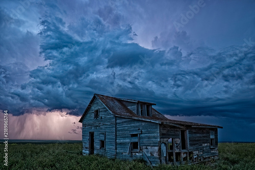 Old abandoned house with storm