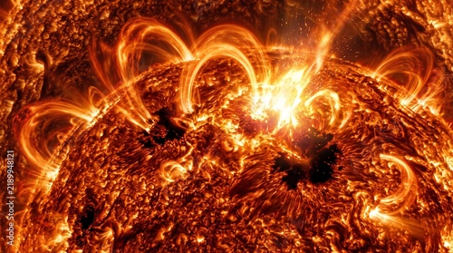 Intense Solar Flare Eruption Featuring Glowing Plasma Loops Radiating From The Surface Of A Burning Star In Deep Space