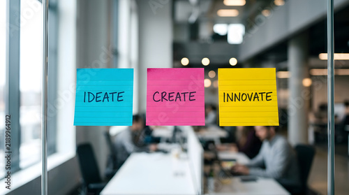 Creative business strategy sticky notes in modern office