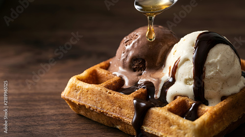 Belgian waffle with chocolate ice cream and caramel sauce