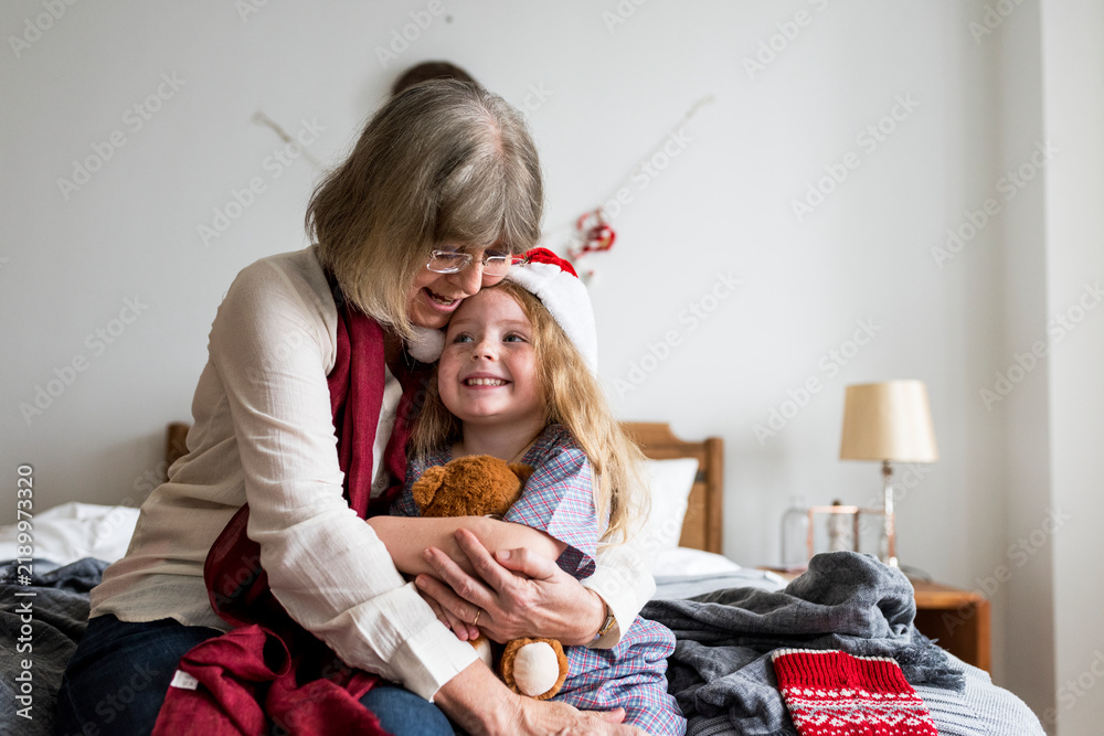Obraz premium People enjoying Christmas holiday at home