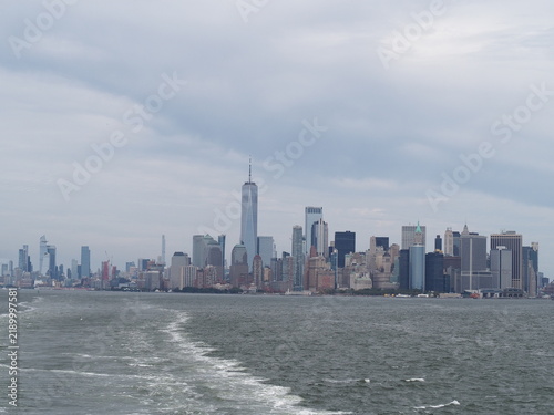 Lower Manhattan skyline featuring One World Trade Center viewed from ferry in New York