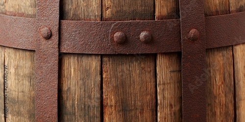 Close-up of weathered wooden barrel staves with rusty metal bands and rivets, textured background