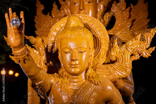 Buddhist Lent tradition, a beautiful display of wisdom, beeswax candles create art as a Buddhist offering.Background with Thai pattern carved on the surface of Lent candle.Ubon Ratchathani.Festival