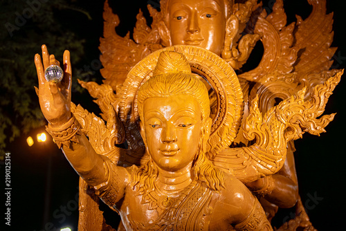 Buddhist Lent tradition, a beautiful display of wisdom, beeswax candles create art as a Buddhist offering.Background with Thai pattern carved on the surface of Lent candle.Ubon Ratchathani.Festival