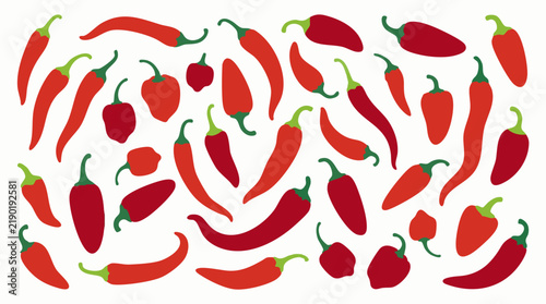 Bild auf Leinwand Vibrant assortment of red and orange chili peppers on white background